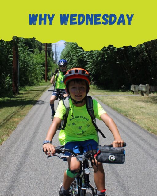 This week’s #WhyWednesday: “Why the Neon Camp Tshirts?”

“We saw your campers coming like a swarm of bees” If you spend time near the B&A Trail or in Tenleytown in the summer, chances are you’ve noticed our pack of bike riders in matching safety green PedalPower Kids tees. That color choice is not only fun and happy- but VERY intentional.

Safety Green is one of the most visible colors to the human eye, especially in daylight. For drivers, it stands out quickly against roads, sidewalks, and natural backgrounds, helping riders be seen sooner and more clearly. That extra visibility adds an important layer of safety.

We use this as an opportunity to teach riders and families a bigger lesson: being seen is just as important as being skilled.

That’s why we also emphasize:
- Wearing reflective or high-visibility clothing when riding
- Using bike lights, even during the day
- Considering small details like helmet lights to increase visibility from all angles

Building safe habits early helps riders feel more confident and prepared every time they get on their bike.